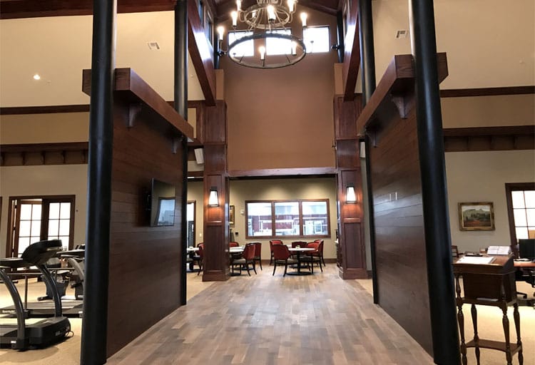 Bright common area with vaulted ceilings and seating