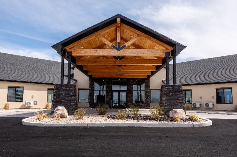 Exterior view of Three Peaks Assisted Living facility