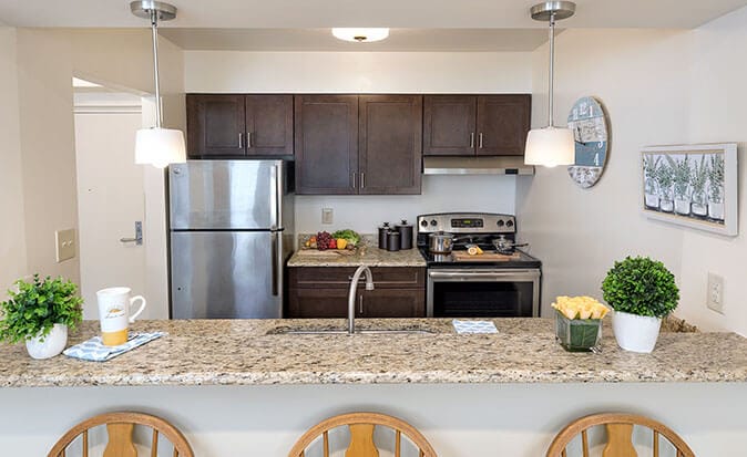 Bright kitchen area with modern appliances and decor
