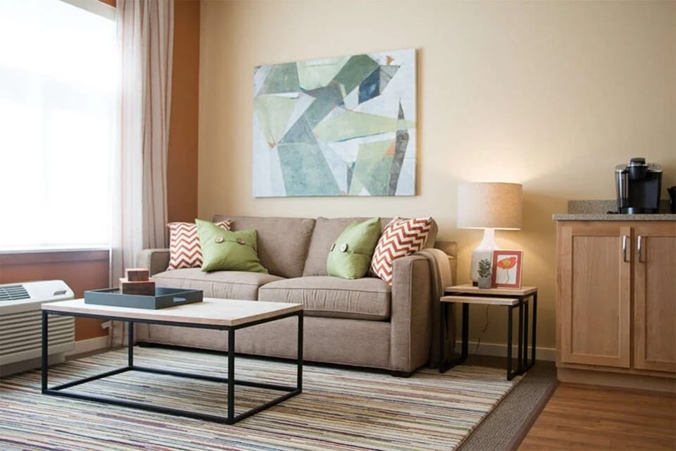 Cozy living area with couch and artwork