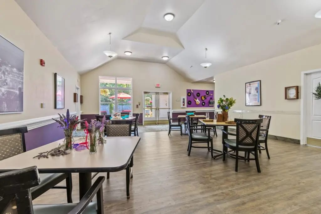Bright common area with tables and chairs