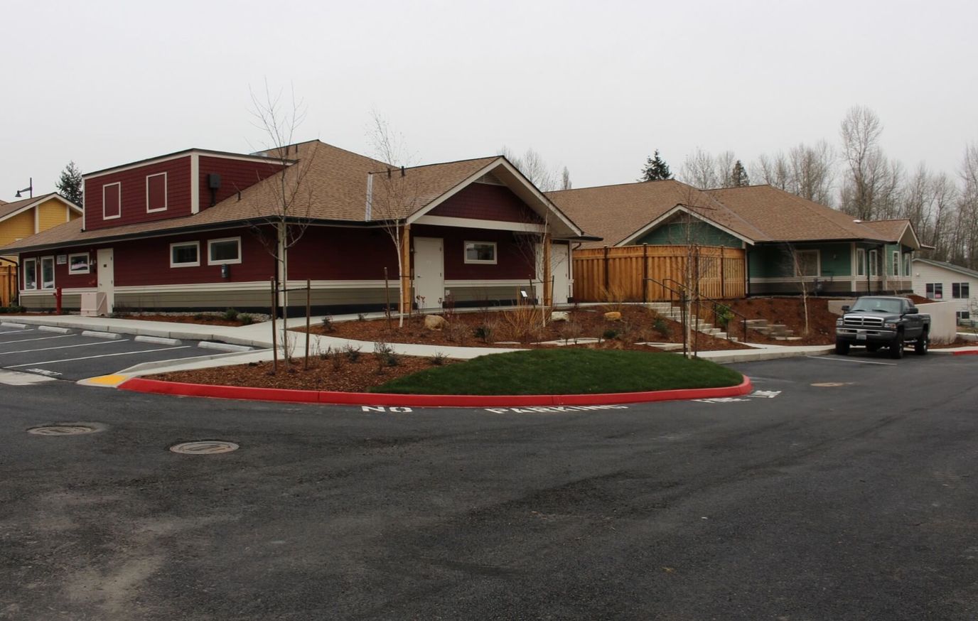 Exterior view of a senior care facility with landscaped pathways