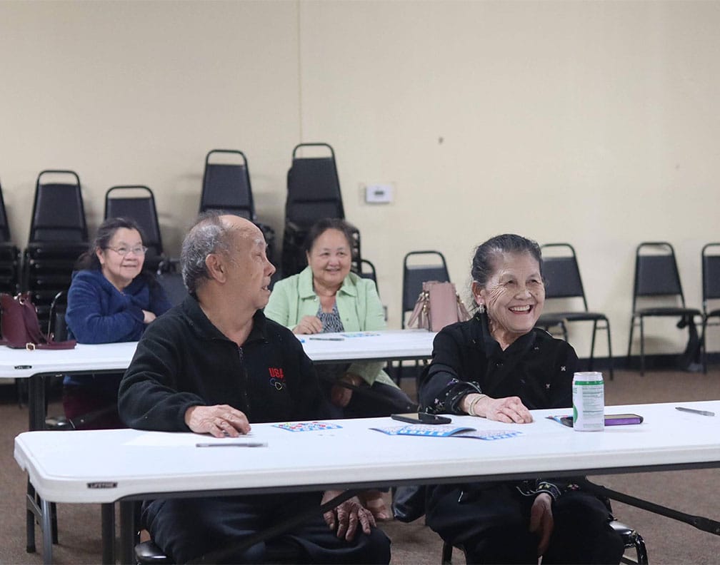 Residents enjoying a bingo game in an activity room