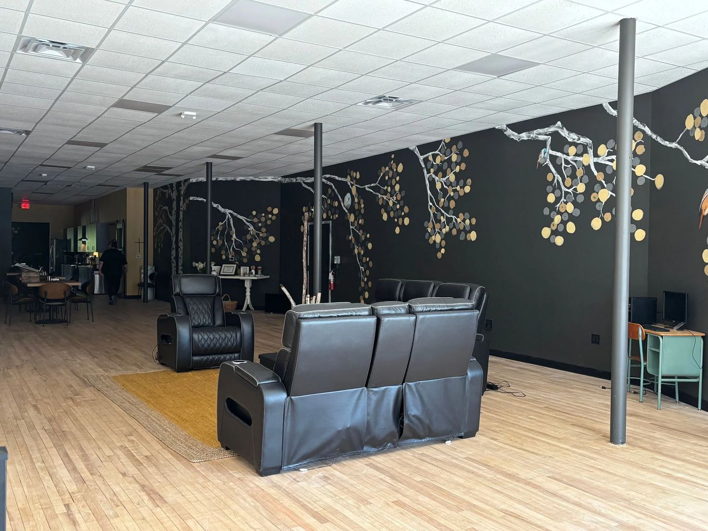 Bright common area with modern seating and décor