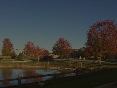 Exterior view of Woodlands Senior Park during autumn