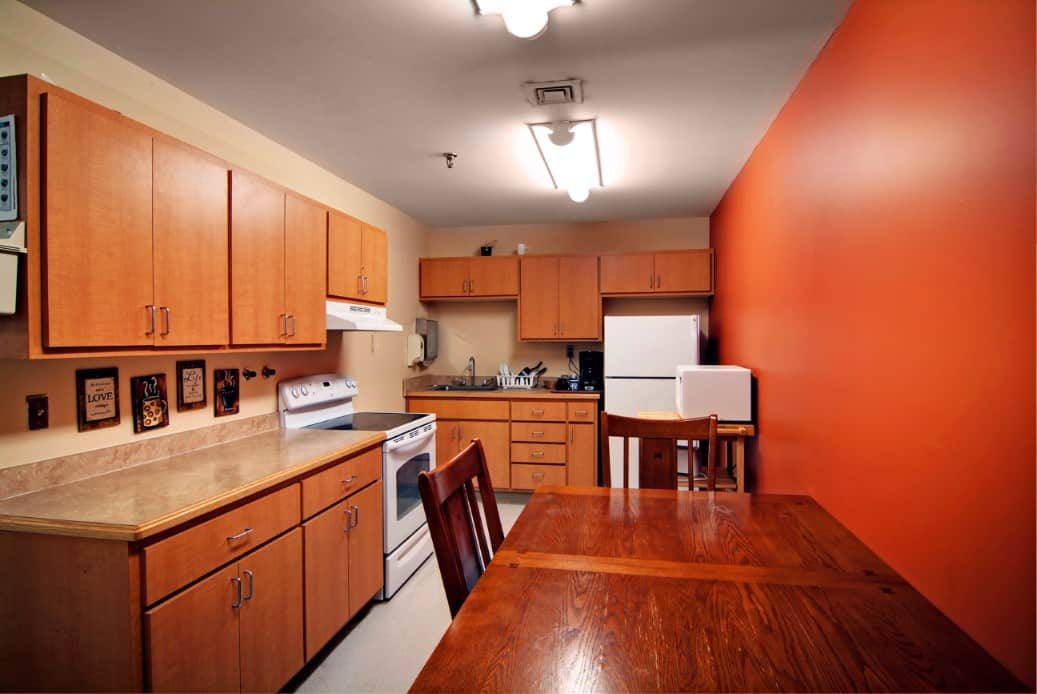 A clean kitchen area in a senior living facility