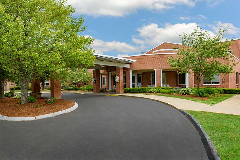 Exterior view of Life Care Center with landscaping