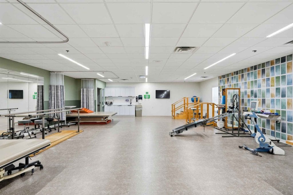 Interior view of a physical therapy room with equipment