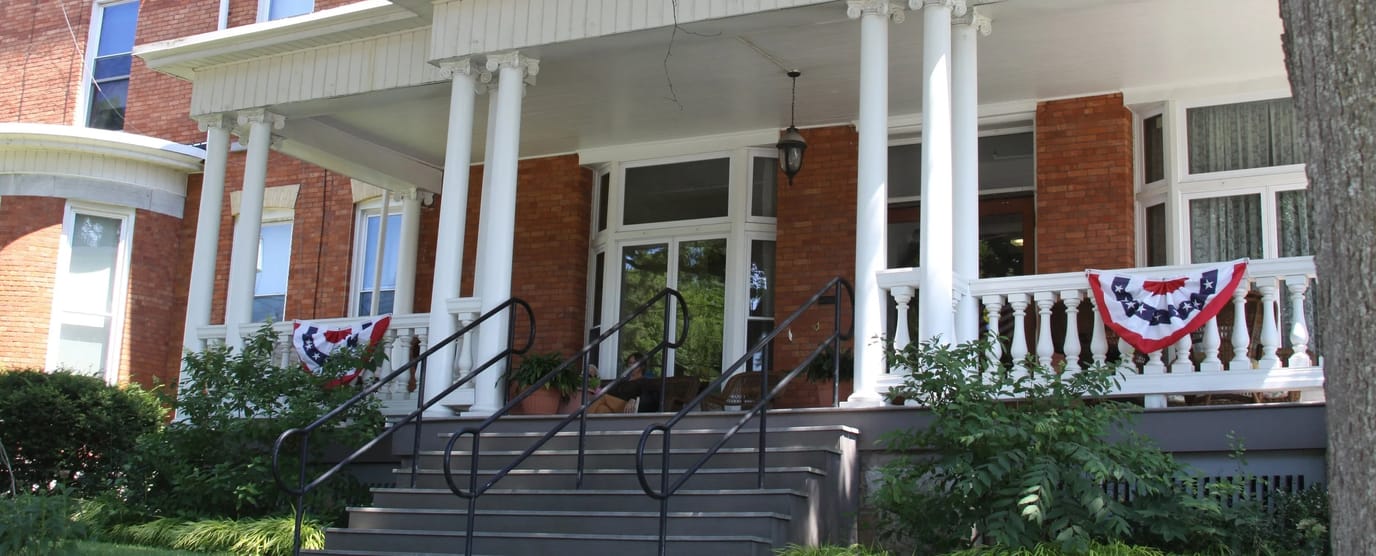 Entrance steps adorned with festive banners