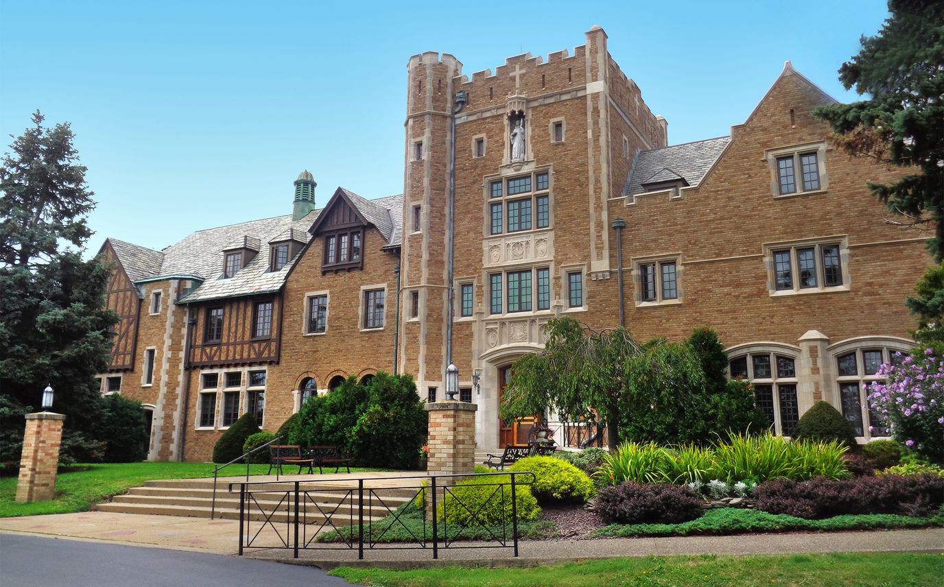 Exterior view of St. Columban's building with gardens