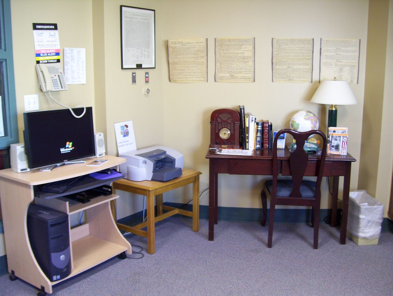 Interior corner of a room with a desk and computer