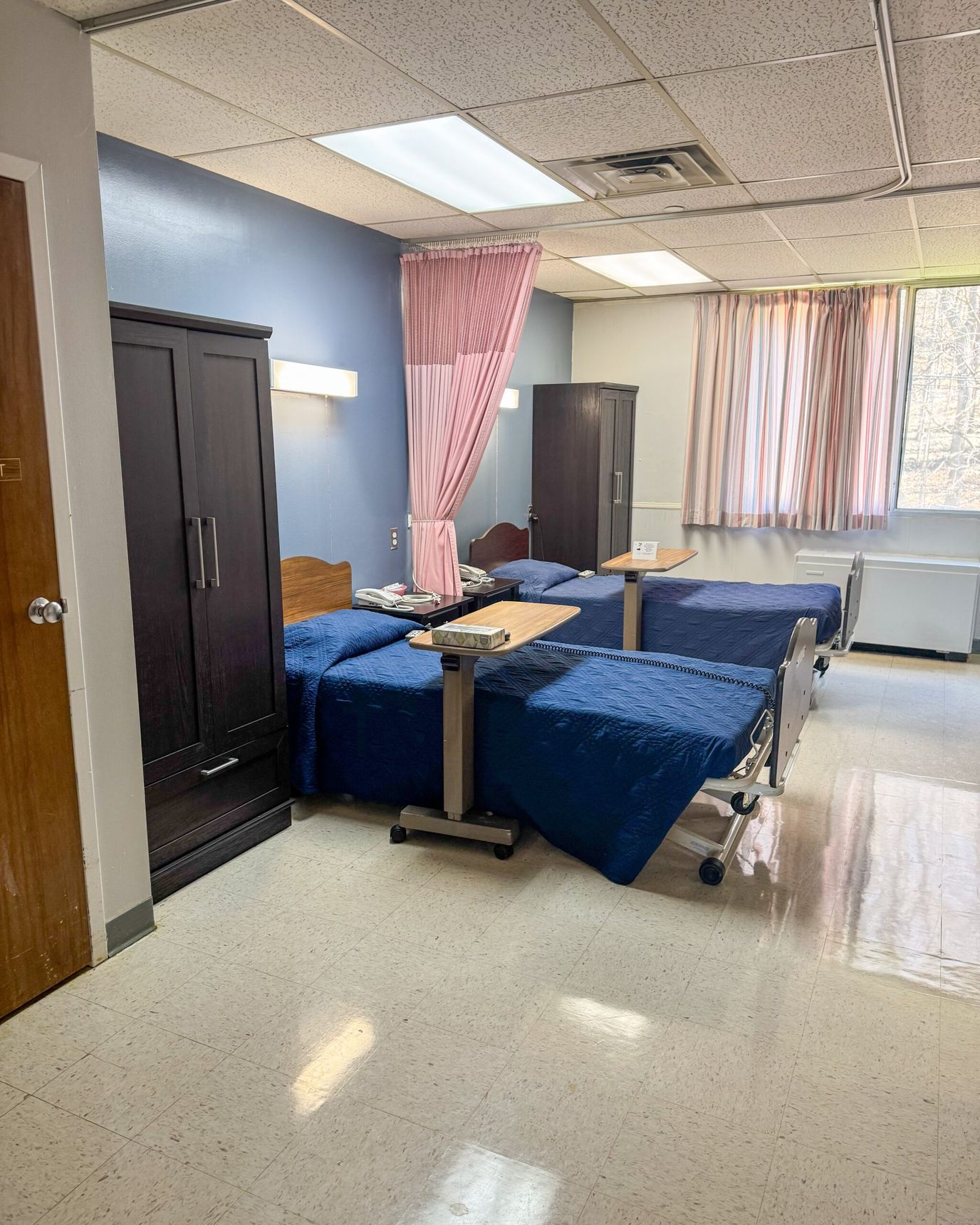 Interior view of a resident room with two beds