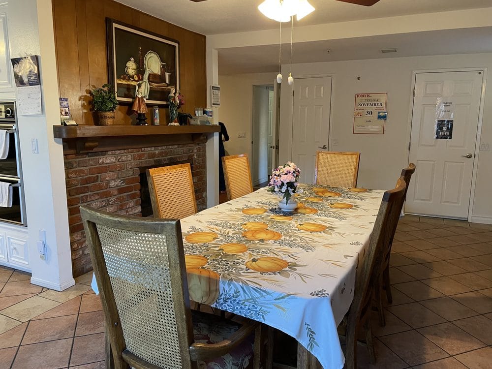 Dining area with a large table and decor