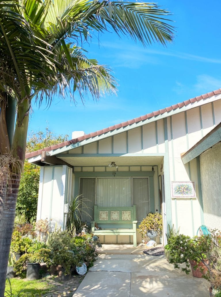 Warm entrance of a cozy assisted living facility with plants