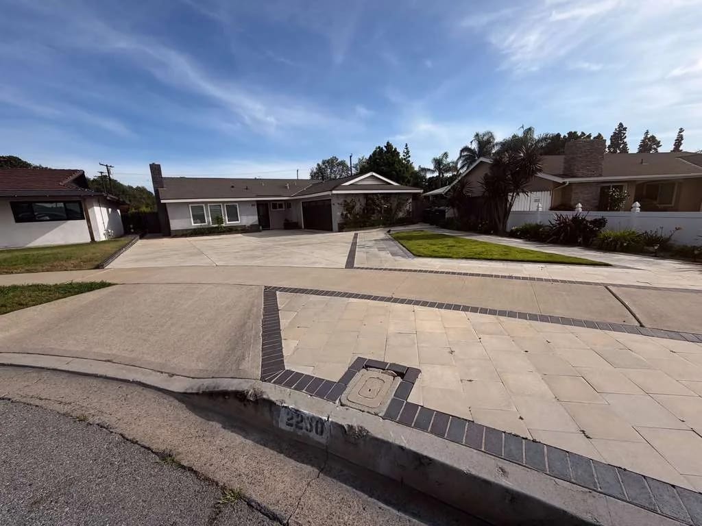 Exterior view of a residential building with driveway