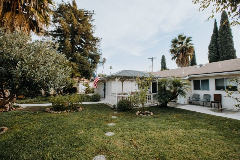Outdoor seating area with gazebo and gardens