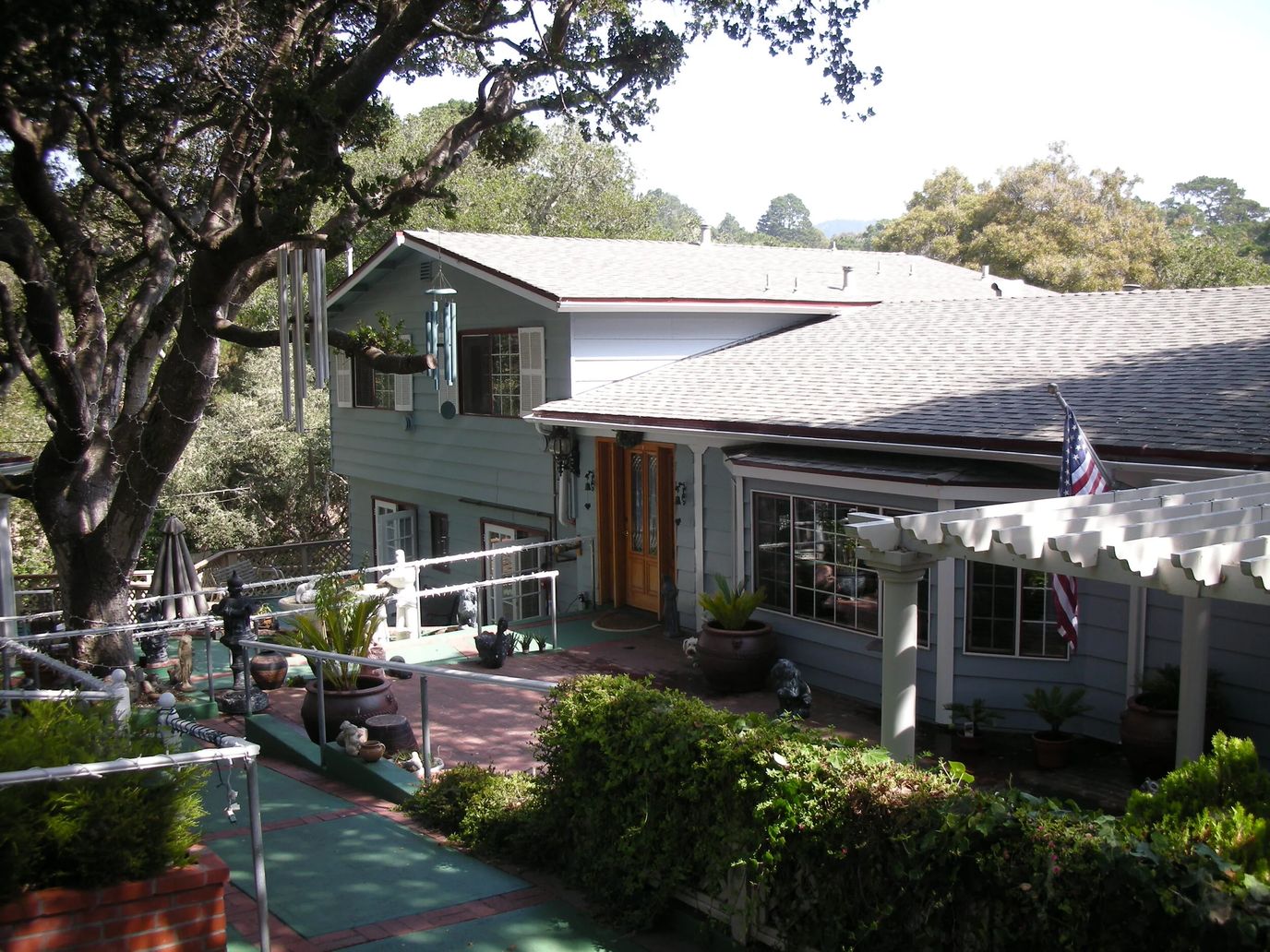 Exterior view of a senior care facility with gardens