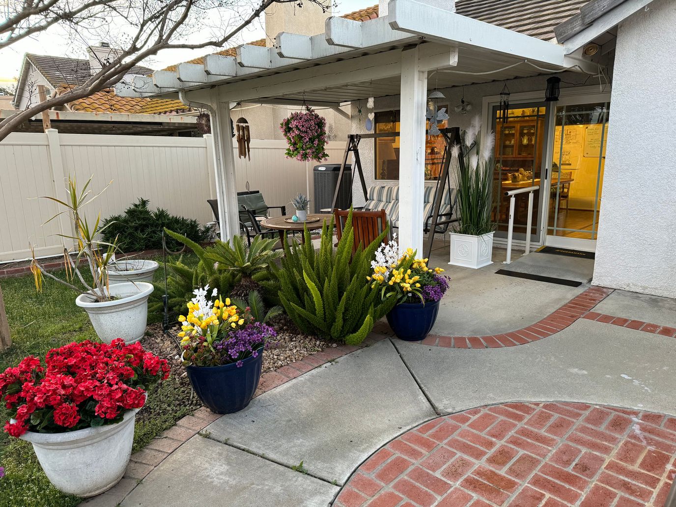 Welcoming outdoor area with colorful flowers and seating