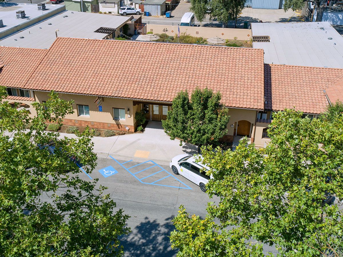 Aerial view of the facility building with accessible parking