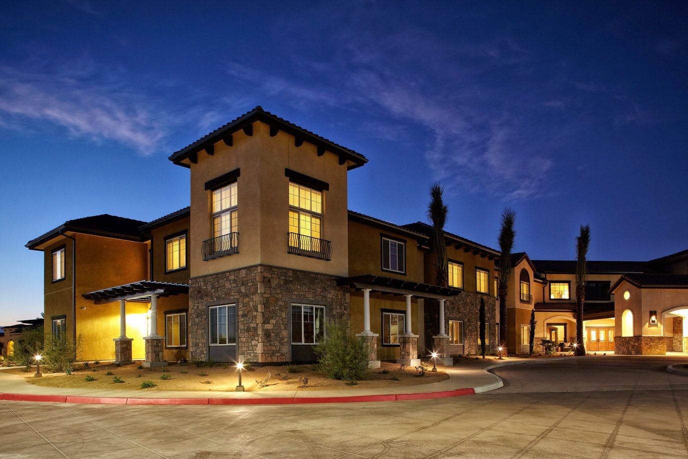 Exterior view of Bella Villaggio at dusk