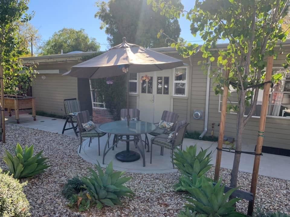 Outdoor seating area with garden and patio