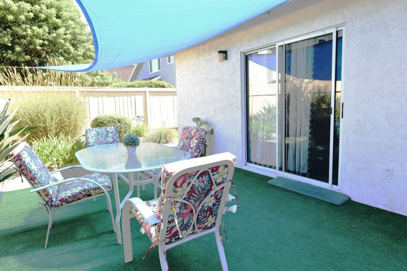 Outdoor seating area with a table and chairs