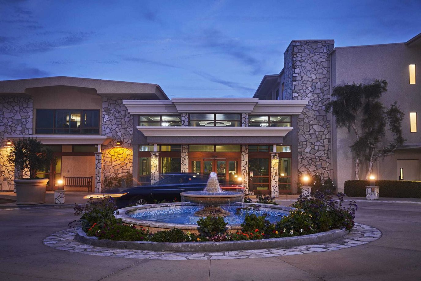 Exterior view of The Canterbury with fountain