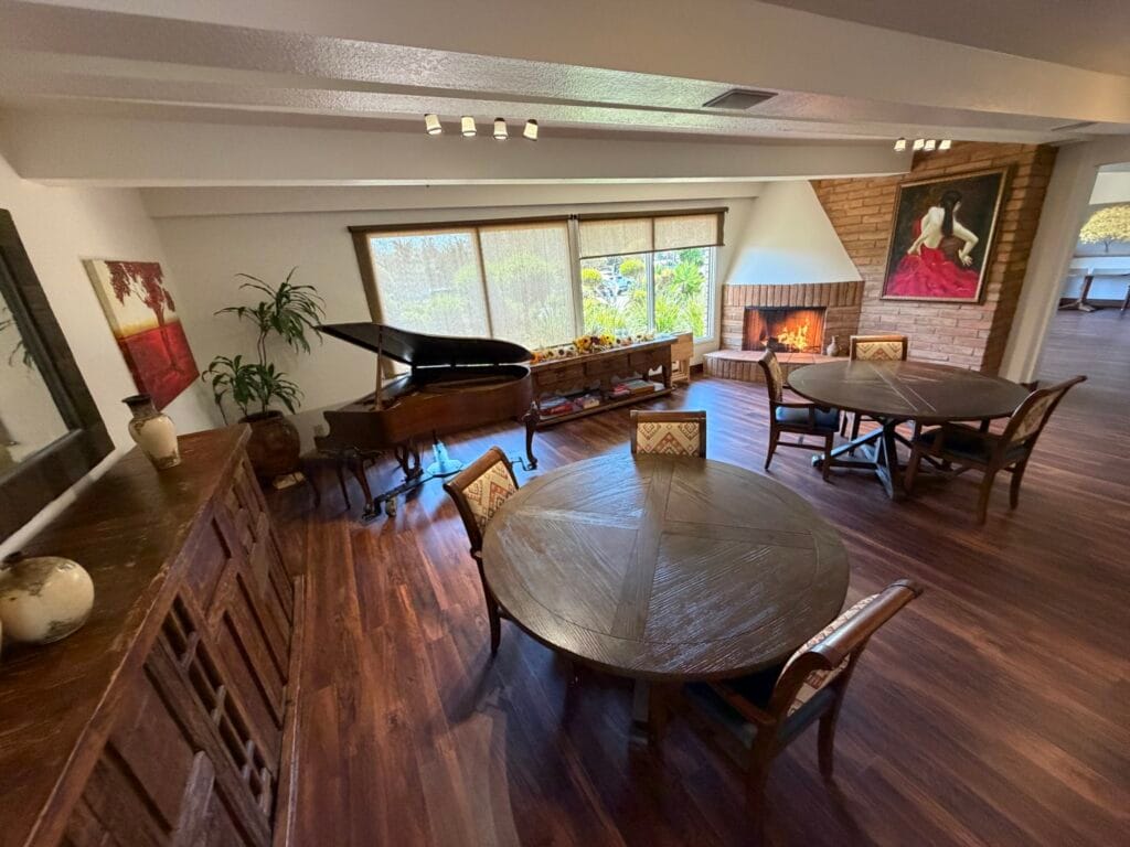 Cozy common area with piano and seating