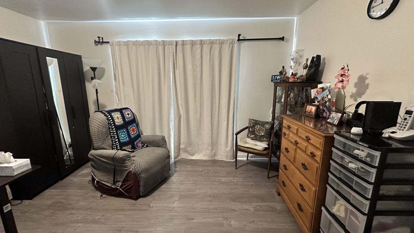 Cozy interior of a private resident room with furniture