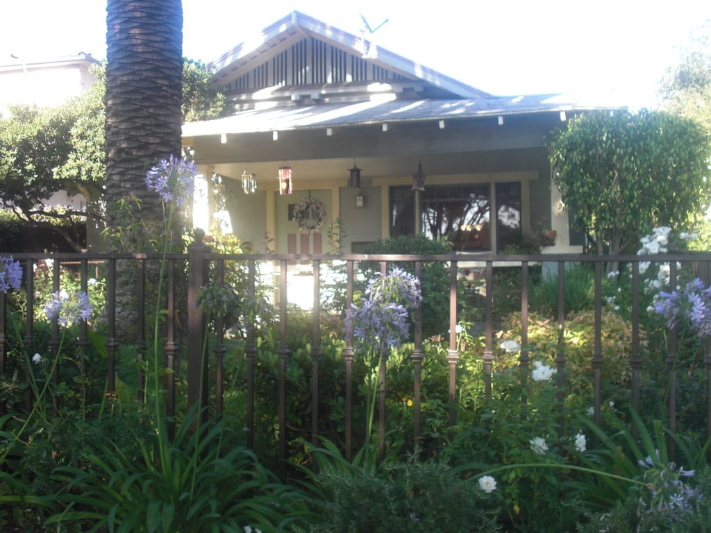 Exterior view of a senior care facility with garden