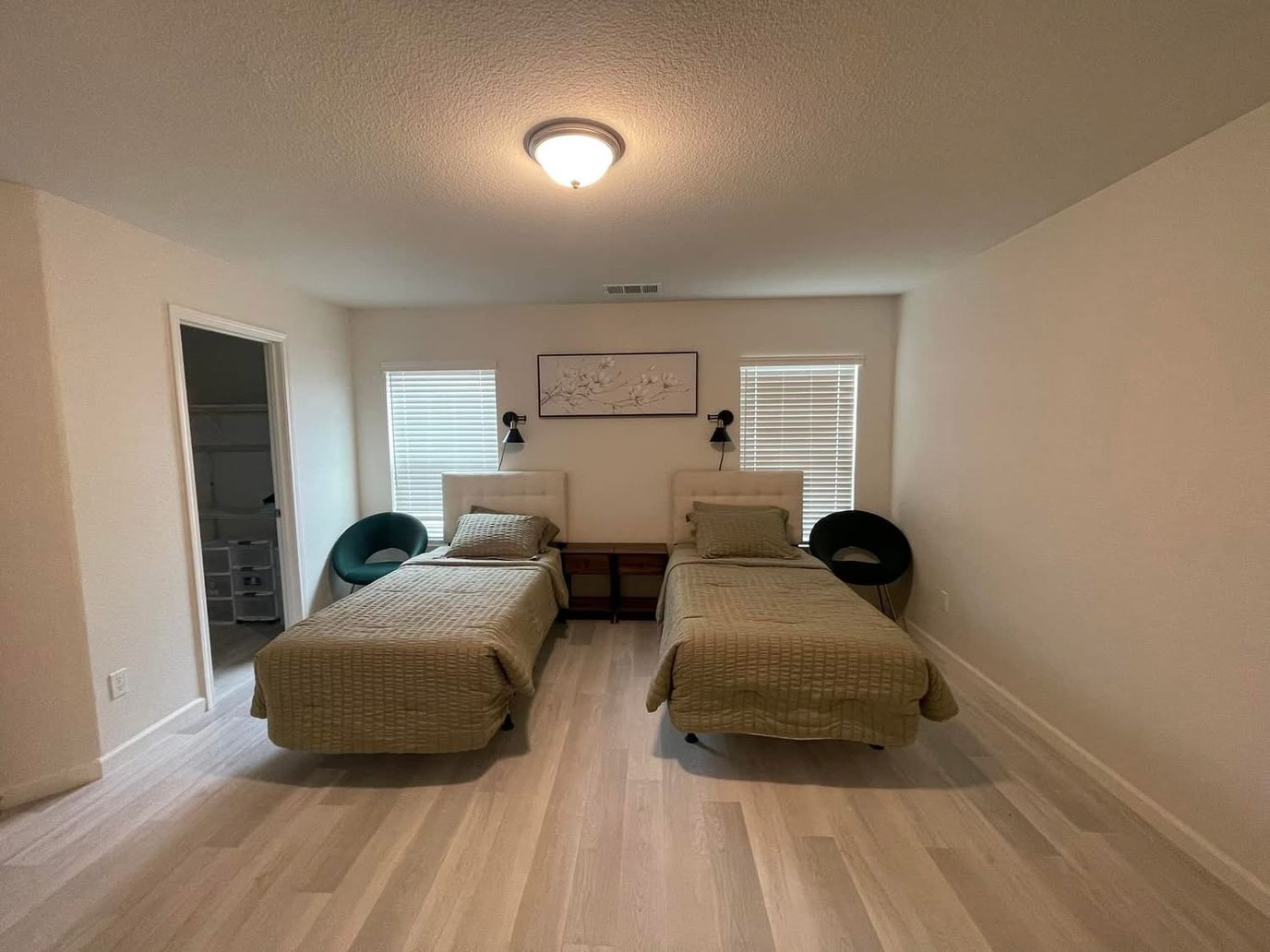 Clean interior view of a resident room with twin beds