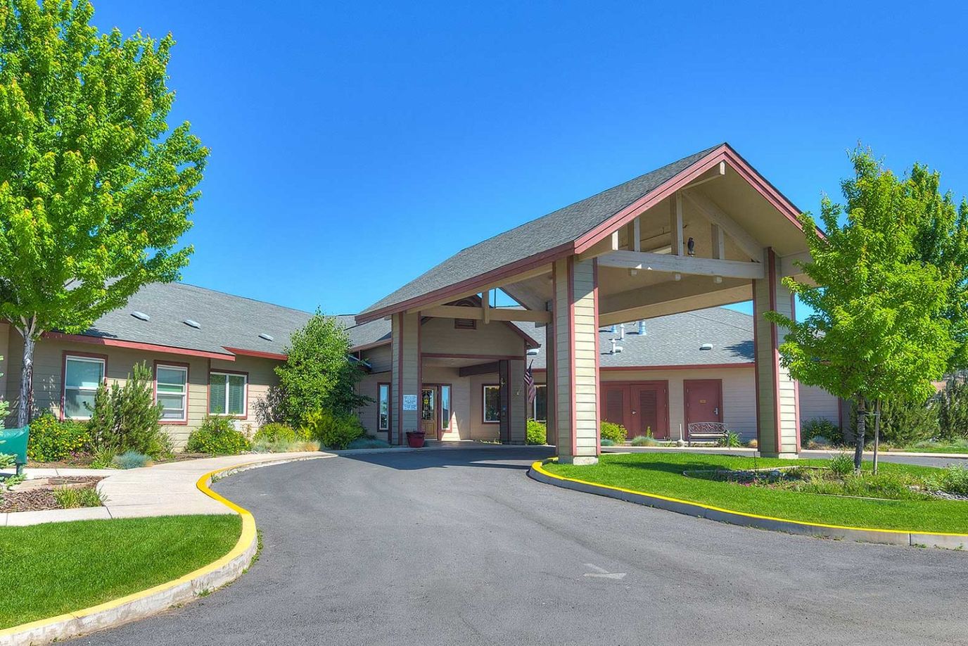Entrance of Eagle Lake Village with landscaped areas