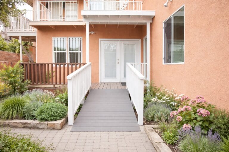 Wheelchair-accessible entrance with landscaped area