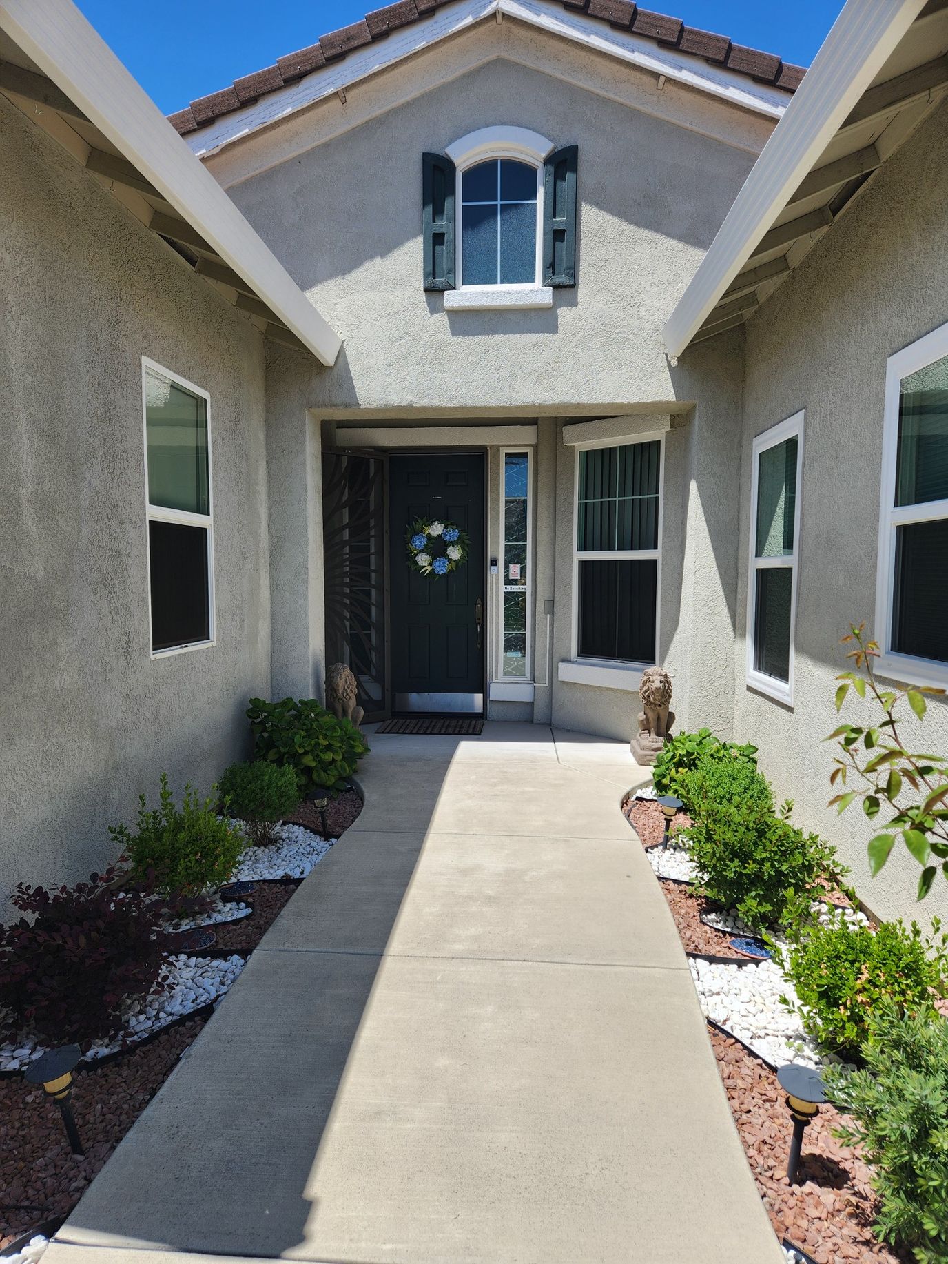 Entrance pathway leading to a senior living facility