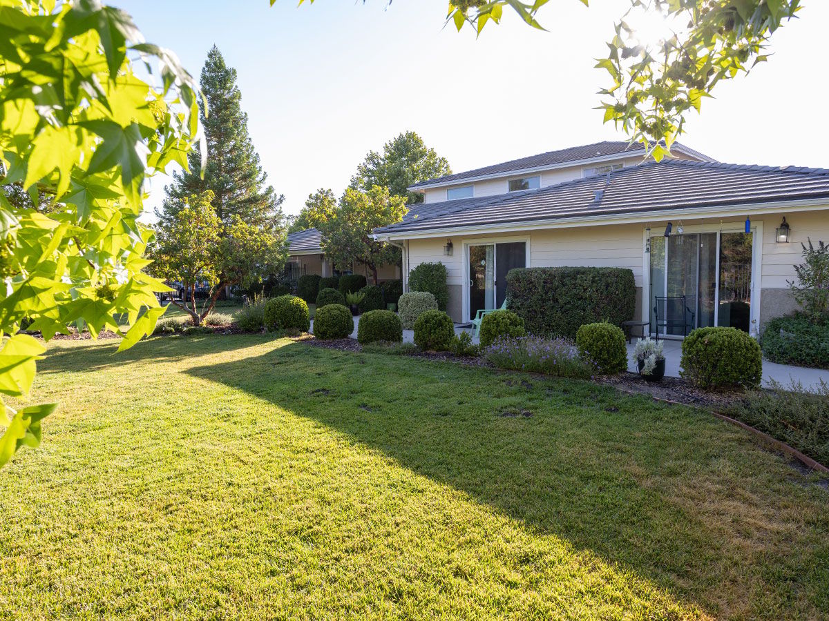 Well-maintained garden and exterior of the facility