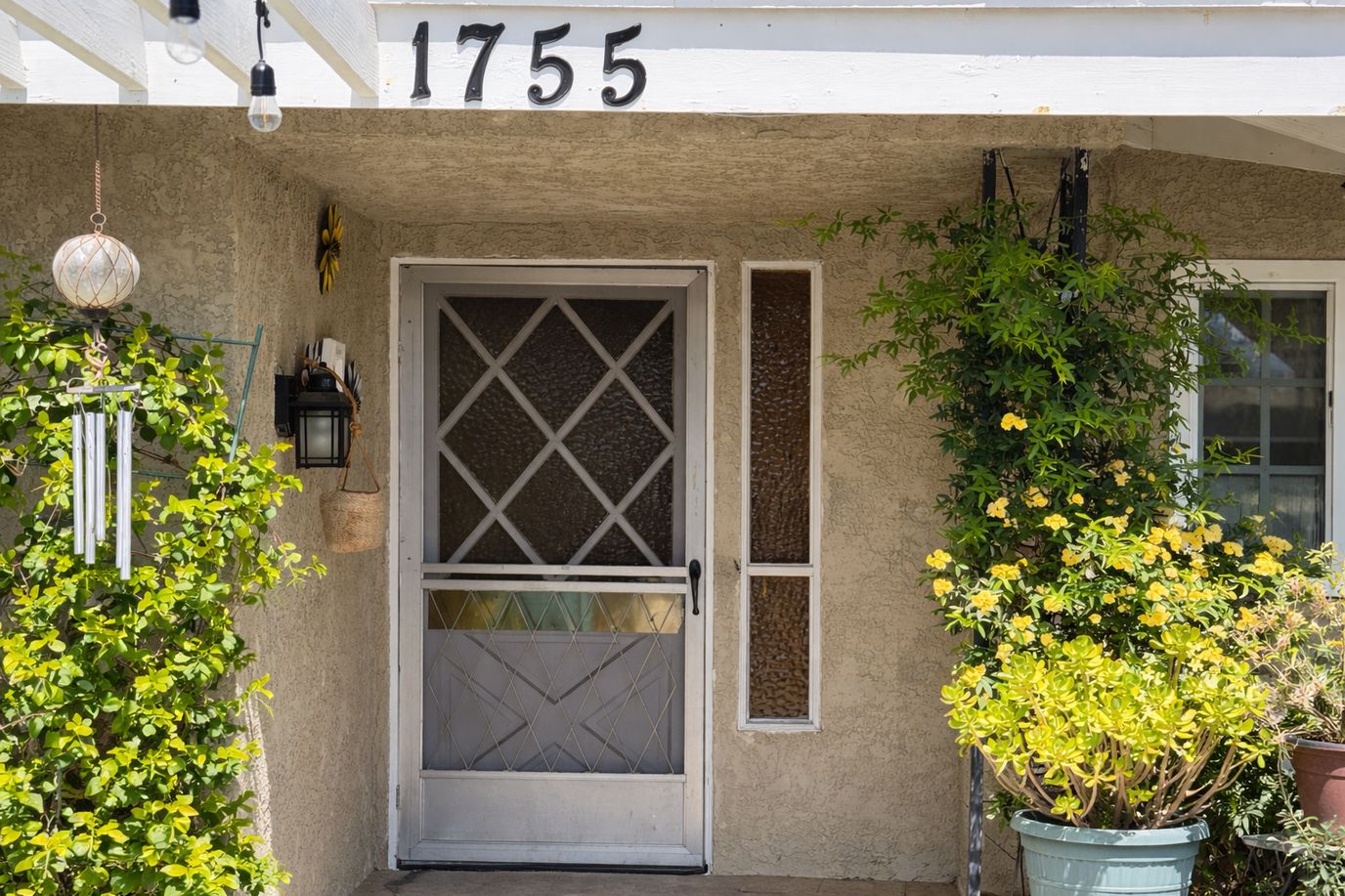 Entrance of a residential care facility with plants
