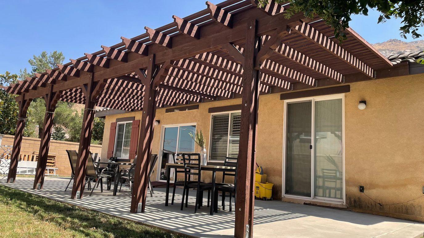 Outdoor patio area with tables and chairs