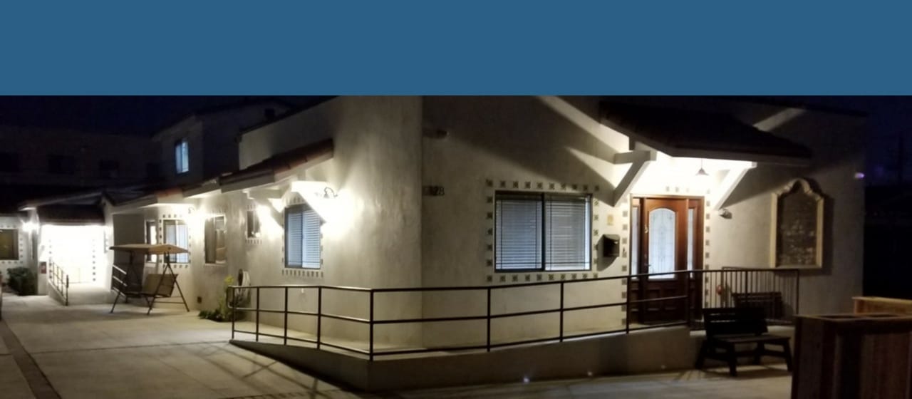 Profile photo of the facility exterior at night