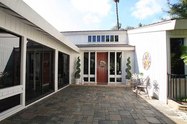 Entrance to a senior care facility with a patio