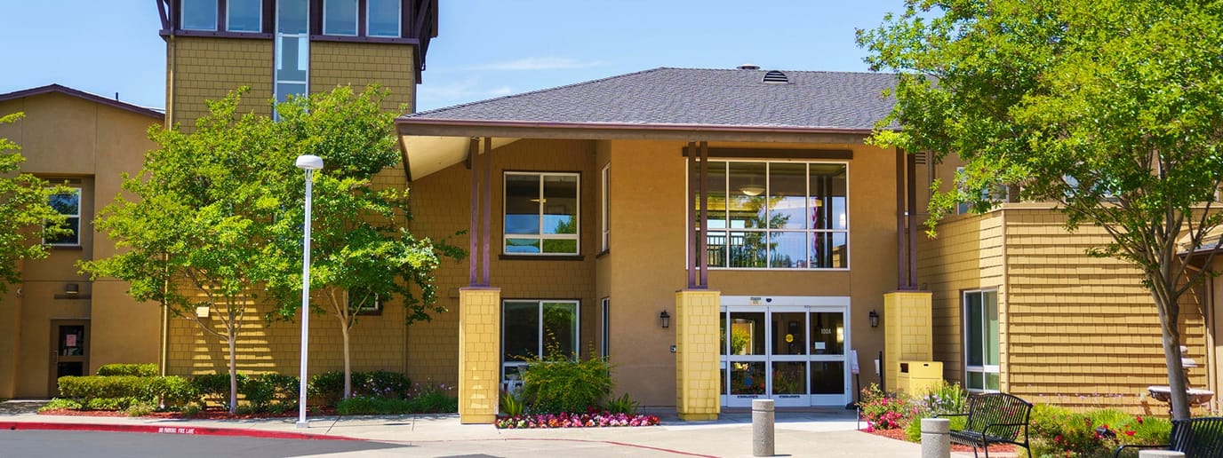 Exterior view of The Parkview entrance with landscaping