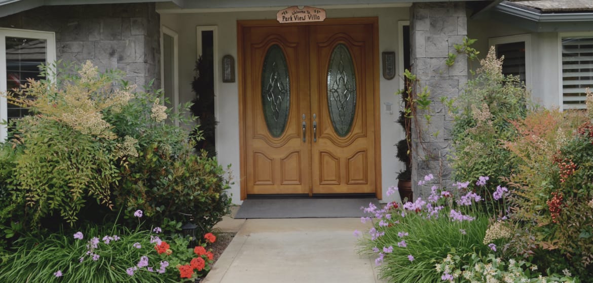 Entrance of Park View Villa with flowers