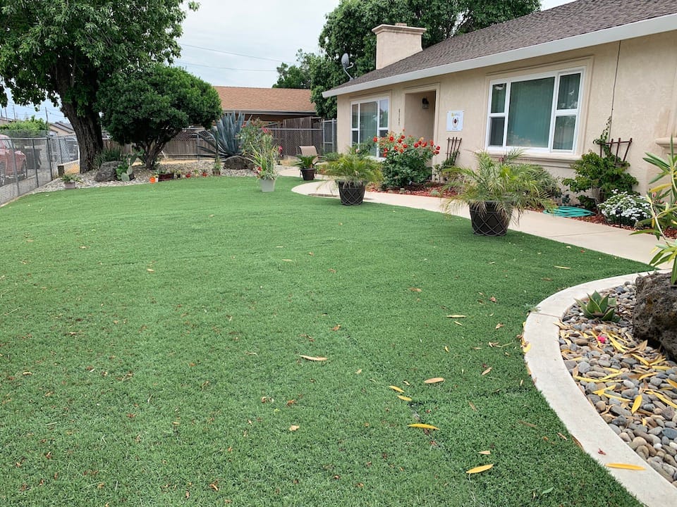 Exterior view of a well-kept assisted living facility