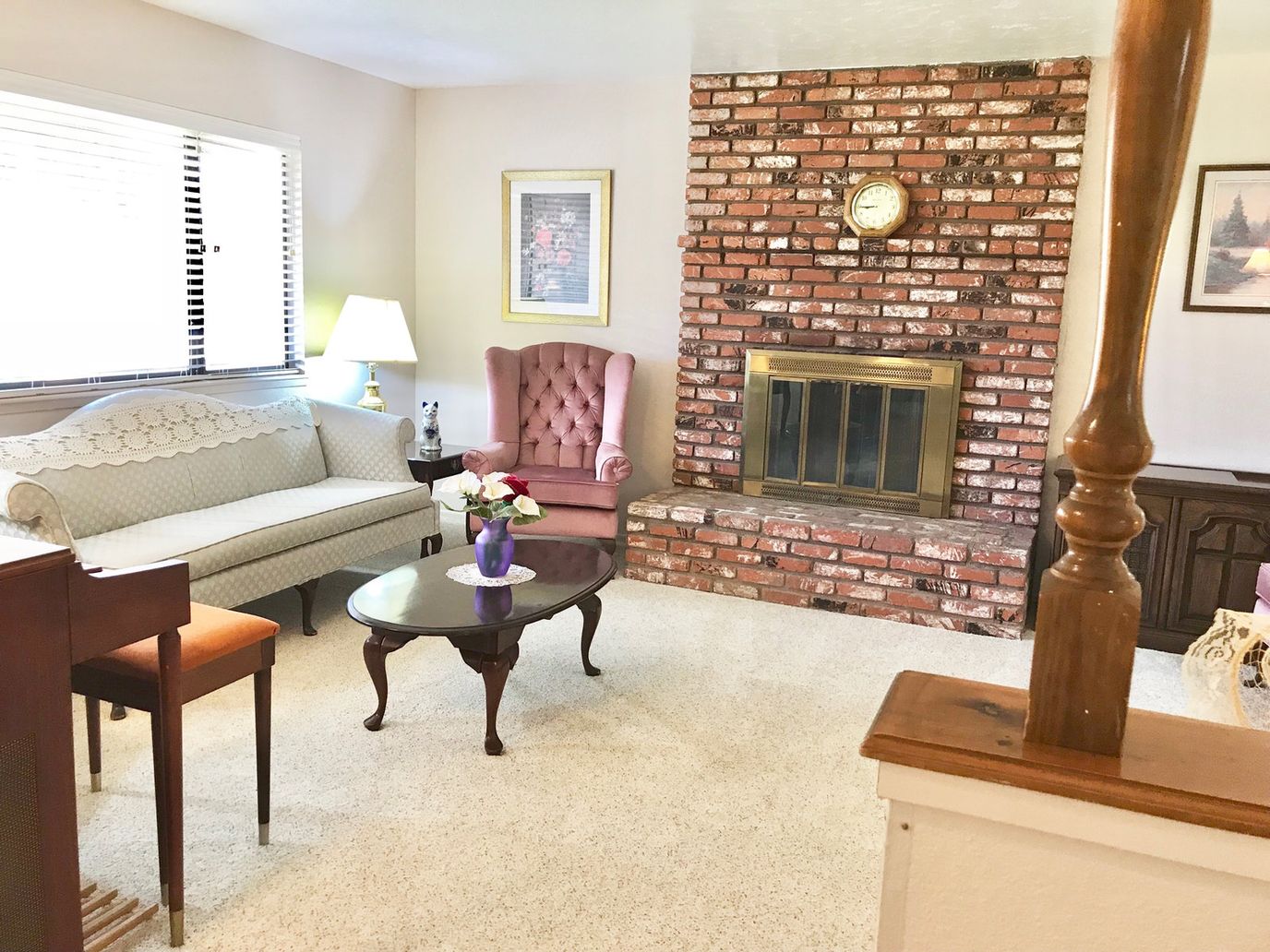 Cozy common area with a fireplace and seating