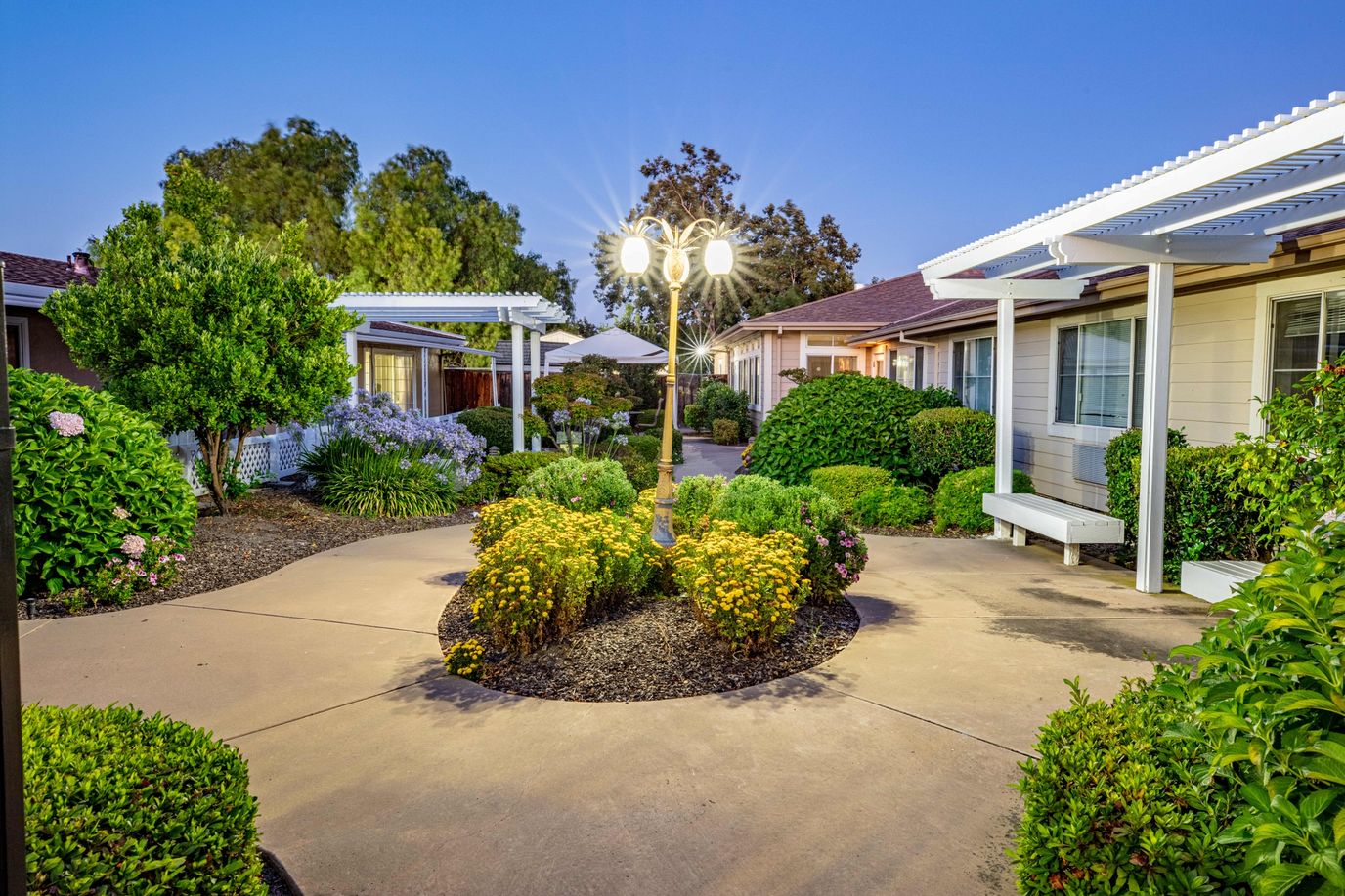 Well-maintained garden path in a senior living facility