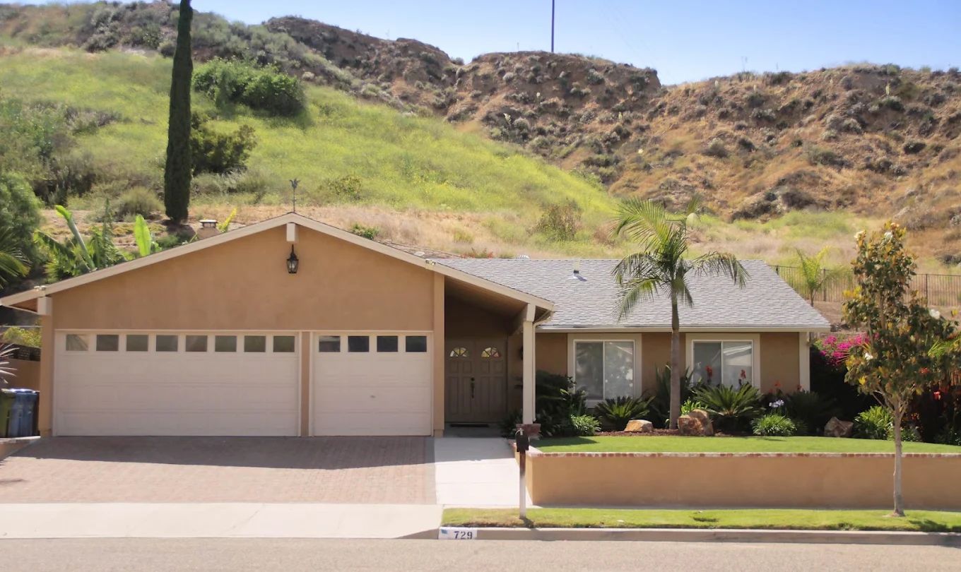 Exterior view of a residential building with landscaping