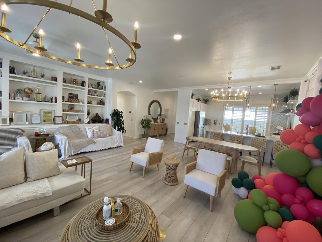 Bright and welcoming common area with seating and decor