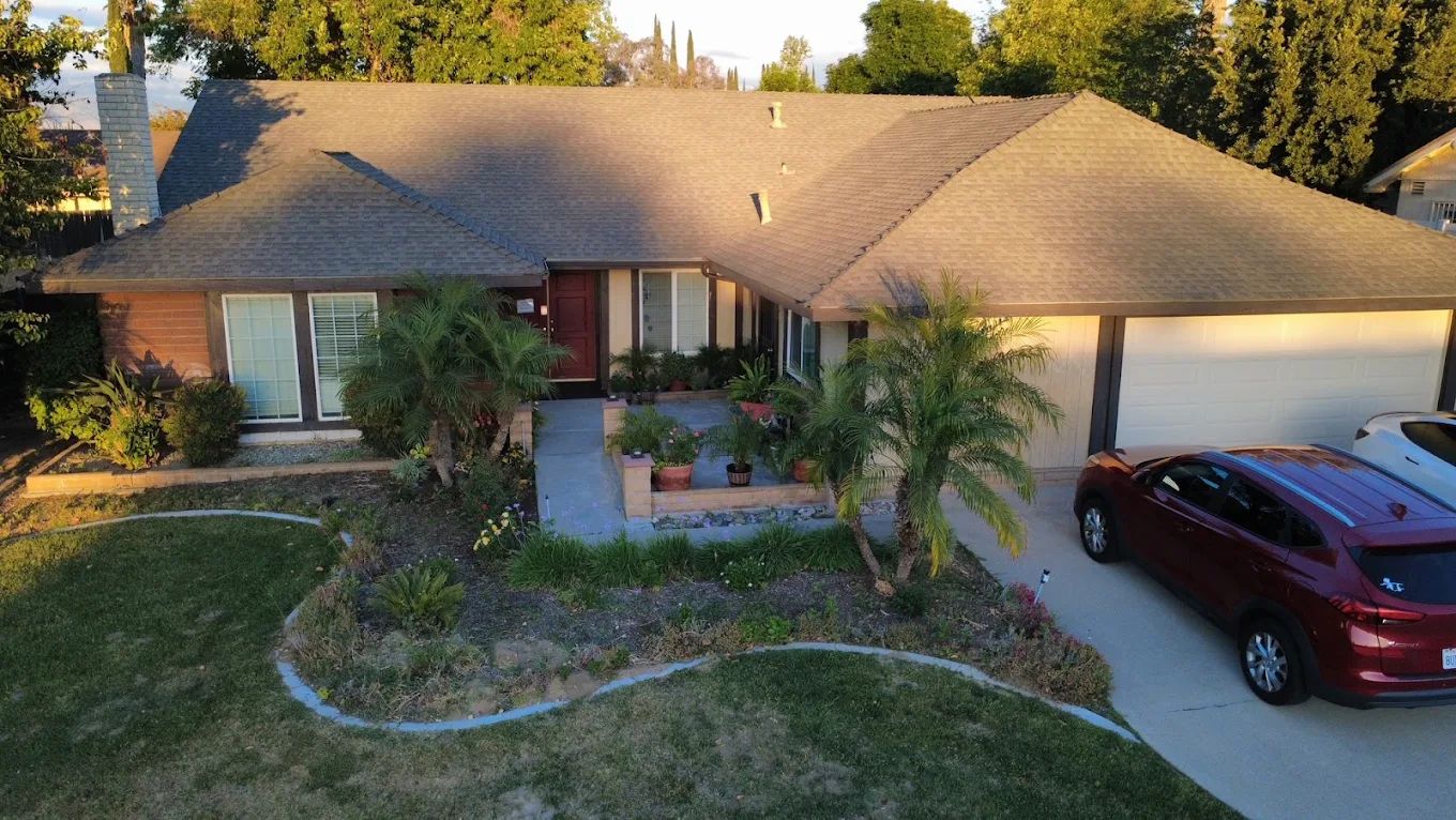 Front view of a house with garden and driveway