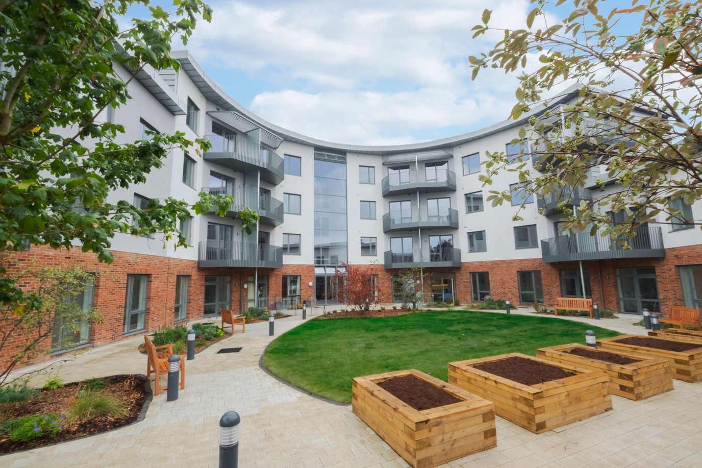 Exterior view of a senior living facility courtyard