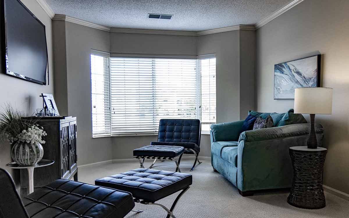 Bright and cozy living room area in assisted living facility