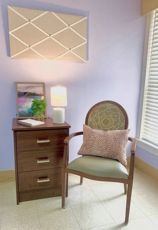Cozy corner of a room with chair and decorative accents